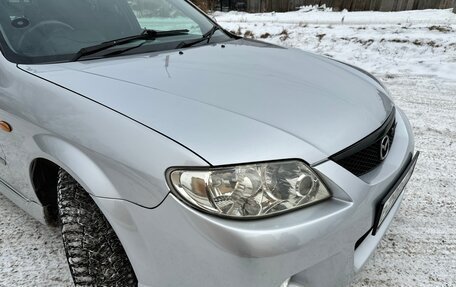 Mazda Familia, 2002 год, 430 000 рублей, 17 фотография