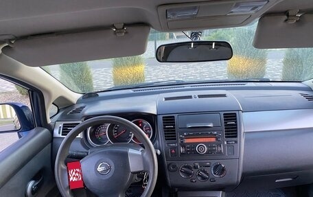 Nissan Tiida, 2010 год, 945 000 рублей, 13 фотография