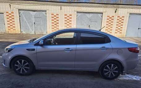 KIA Rio III рестайлинг, 2013 год, 679 000 рублей, 7 фотография