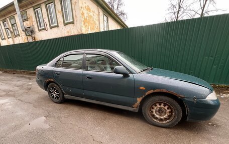 Mitsubishi Carisma I, 1997 год, 149 000 рублей, 4 фотография