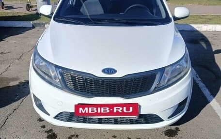 KIA Rio III рестайлинг, 2012 год, 880 000 рублей, 10 фотография