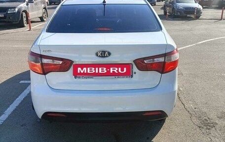 KIA Rio III рестайлинг, 2012 год, 880 000 рублей, 13 фотография