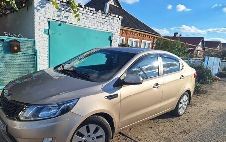 KIA Rio III рестайлинг, 2012 год, 1 000 000 рублей, 2 фотография