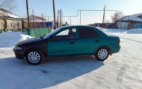 Mazda 323, 1997 год, 150 000 рублей, 9 фотография