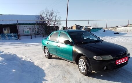 Mazda 323, 1997 год, 150 000 рублей, 6 фотография