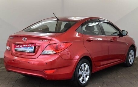 Hyundai Solaris II рестайлинг, 2011 год, 670 000 рублей, 4 фотография