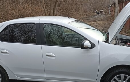 Renault Logan II, 2017 год, 900 000 рублей, 11 фотография