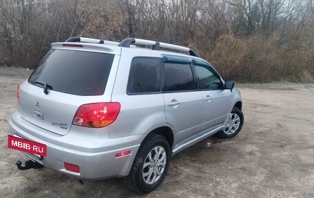 Mitsubishi Outlander III рестайлинг 3, 2003 год, 635 000 рублей, 4 фотография