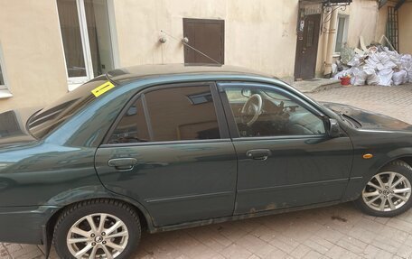 Mazda 323, 2001 год, 270 000 рублей, 4 фотография