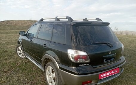 Mitsubishi Outlander III рестайлинг 3, 2005 год, 750 000 рублей, 11 фотография