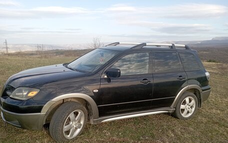 Mitsubishi Outlander III рестайлинг 3, 2005 год, 750 000 рублей, 13 фотография