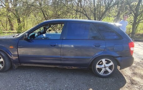 Mazda 323, 2001 год, 140 000 рублей, 9 фотография