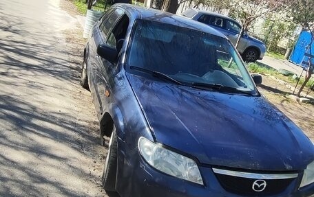 Mazda 323, 2001 год, 140 000 рублей, 6 фотография