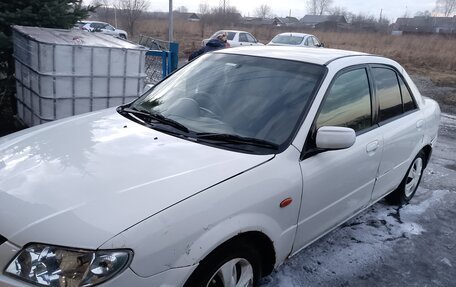 Mazda Familia, 2003 год, 140 000 рублей, 3 фотография