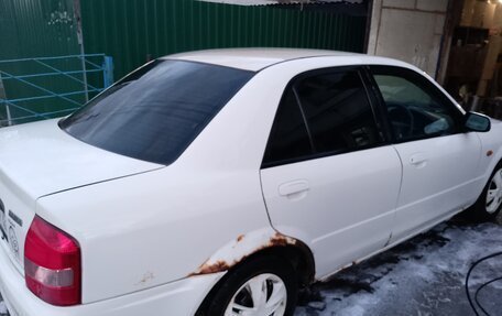 Mazda Familia, 2003 год, 140 000 рублей, 6 фотография