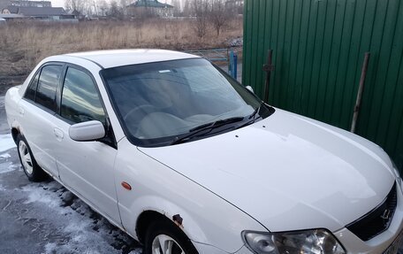 Mazda Familia, 2003 год, 140 000 рублей, 7 фотография