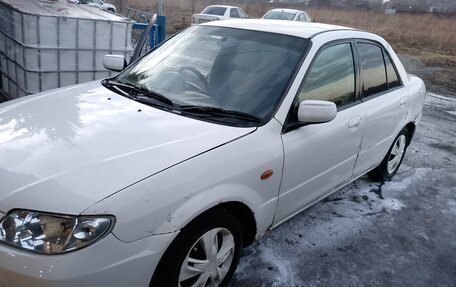 Mazda Familia, 2003 год, 140 000 рублей, 8 фотография