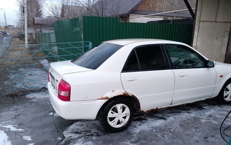 Mazda Familia, 2003 год, 140 000 рублей, 10 фотография
