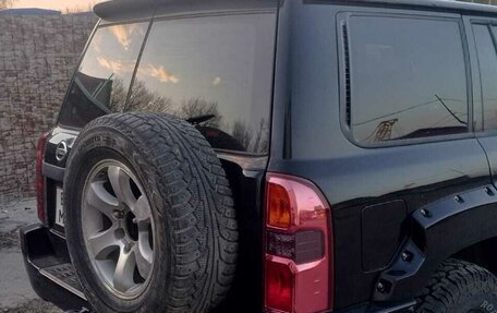 Nissan Patrol, 2011 год, 2 750 000 рублей, 16 фотография