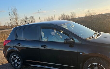 Nissan Tiida, 2010 год, 750 000 рублей, 9 фотография