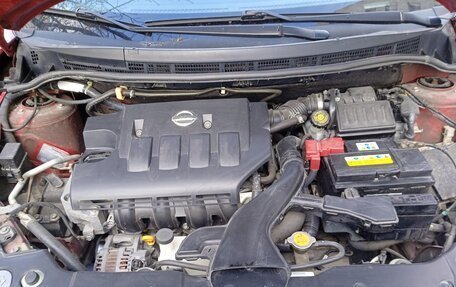 Nissan Tiida, 2010 год, 890 000 рублей, 8 фотография