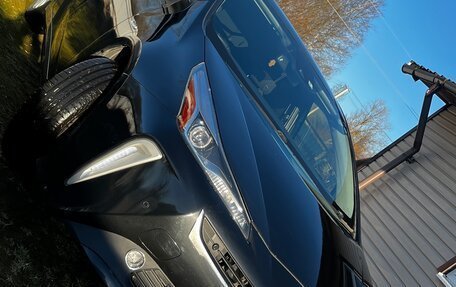 Toyota Prius IV XW50, 2019 год, 1 800 000 рублей, 1 фотография
