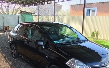 Nissan Tiida, 2011 год, 660 000 рублей, 9 фотография