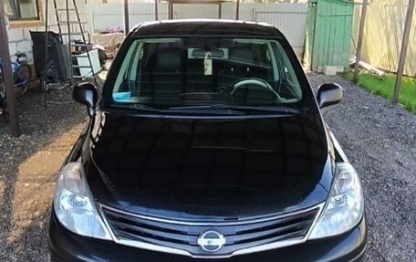 Nissan Tiida, 2011 год, 660 000 рублей, 5 фотография