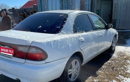 Mazda Familia, 1997 год, 210 000 рублей, 7 фотография