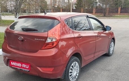 Hyundai Solaris II рестайлинг, 2011 год, 670 000 рублей, 3 фотография