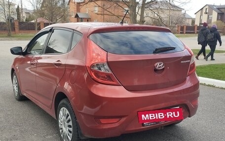 Hyundai Solaris II рестайлинг, 2011 год, 670 000 рублей, 4 фотография