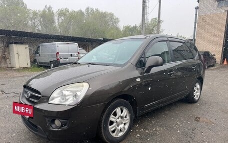 KIA Carens III (RP), 2011 год, 750 000 рублей, 2 фотография