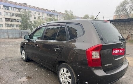 KIA Carens III (RP), 2011 год, 750 000 рублей, 3 фотография