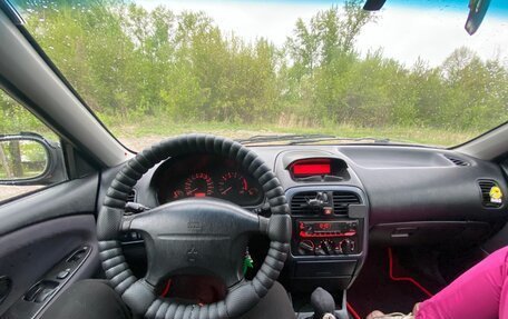 Mitsubishi Carisma I, 1999 год, 300 000 рублей, 9 фотография