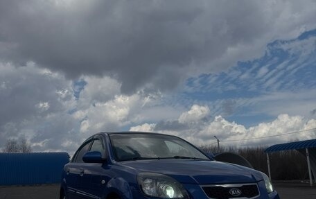 KIA Rio II, 2011 год, 750 000 рублей, 3 фотография