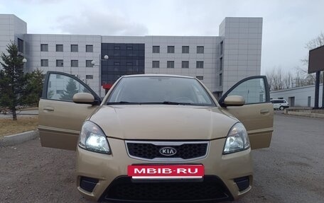 KIA Rio II, 2011 год, 657 000 рублей, 10 фотография