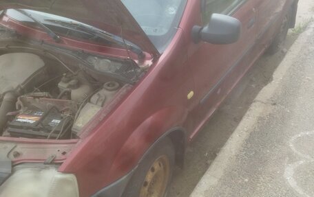 Renault Logan I, 2009 год, 195 000 рублей, 3 фотография