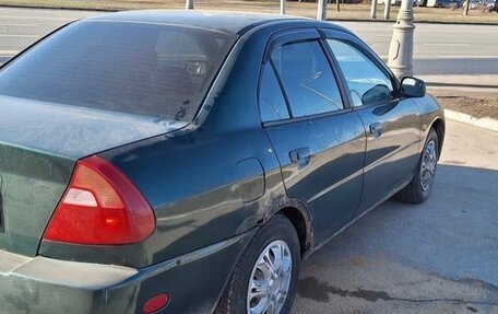 Mitsubishi Mirage VI рестайлинг, 2000 год, 210 000 рублей, 2 фотография