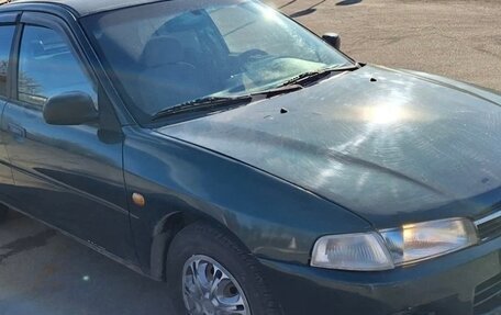 Mitsubishi Mirage VI рестайлинг, 2000 год, 210 000 рублей, 4 фотография