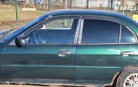 Mitsubishi Mirage VI рестайлинг, 2000 год, 210 000 рублей, 3 фотография