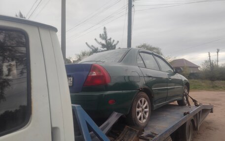 Mitsubishi Mirage VI рестайлинг, 1999 год, 65 000 рублей, 5 фотография