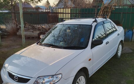 Mazda Familia, 2002 год, 370 000 рублей, 17 фотография