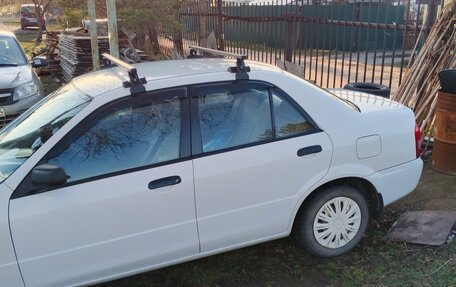 Mazda Familia, 2002 год, 370 000 рублей, 14 фотография