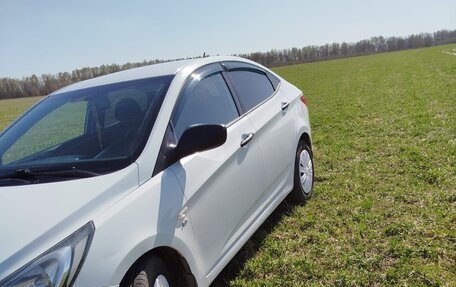 Hyundai Solaris II рестайлинг, 2012 год, 690 000 рублей, 2 фотография