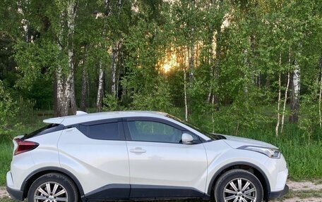 Toyota C-HR I рестайлинг, 2018 год, 2 150 000 рублей, 39 фотография