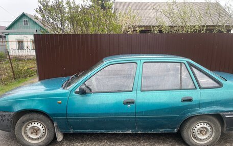 Daewoo Nexia I рестайлинг, 2003 год, 100 000 рублей, 14 фотография