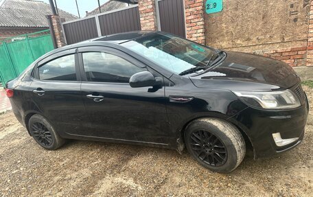 KIA Rio III рестайлинг, 2012 год, 700 000 рублей, 3 фотография