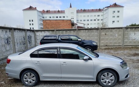 Volkswagen Jetta VI, 2011 год, 850 000 рублей, 2 фотография