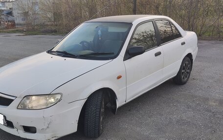 Mazda Familia, 2001 год, 134 000 рублей, 3 фотография