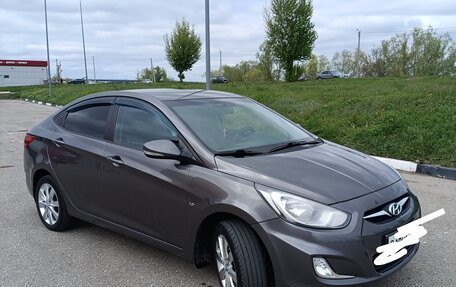 Hyundai Solaris II рестайлинг, 2011 год, 770 000 рублей, 2 фотография